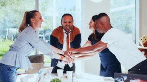 Risk WATCH with Alberta Quarcoopome: Morning Team Huddles Focused on the Customer — A Key Risk Management Strategy